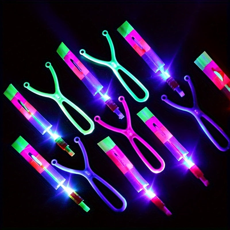 8pcs, Led Lighting Up Luminous Toy, Flying Slingshot, Flying Toys, Fast Catapult Luminous Toy, Glow In Dark Party Supplies, Party Favors, Holiday Gifts, Children Gifts, Outdoor Luminous Toys