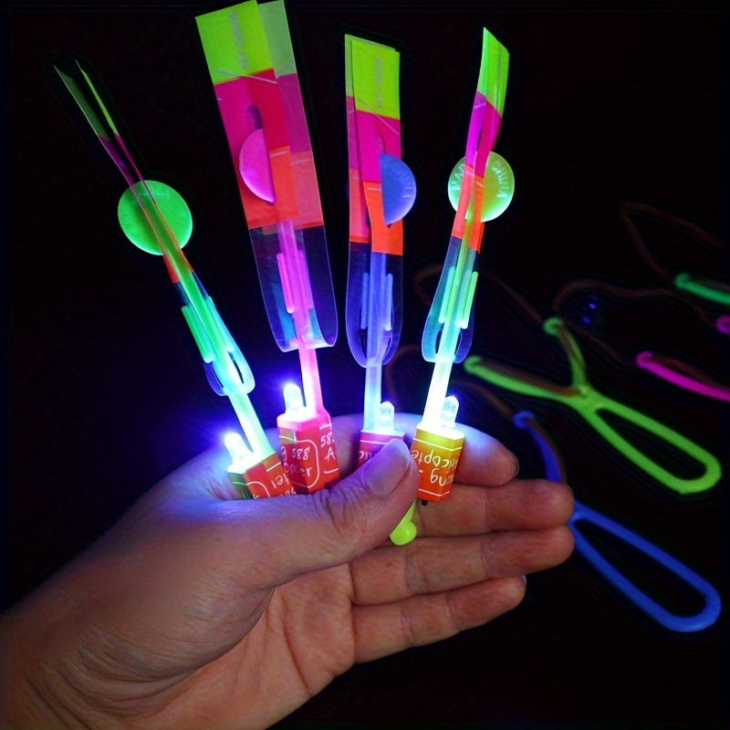8pcs, Led Lighting Up Luminous Toy, Flying Slingshot, Flying Toys, Fast Catapult Luminous Toy, Glow In Dark Party Supplies, Party Favors, Holiday Gifts, Children Gifts, Outdoor Luminous Toys