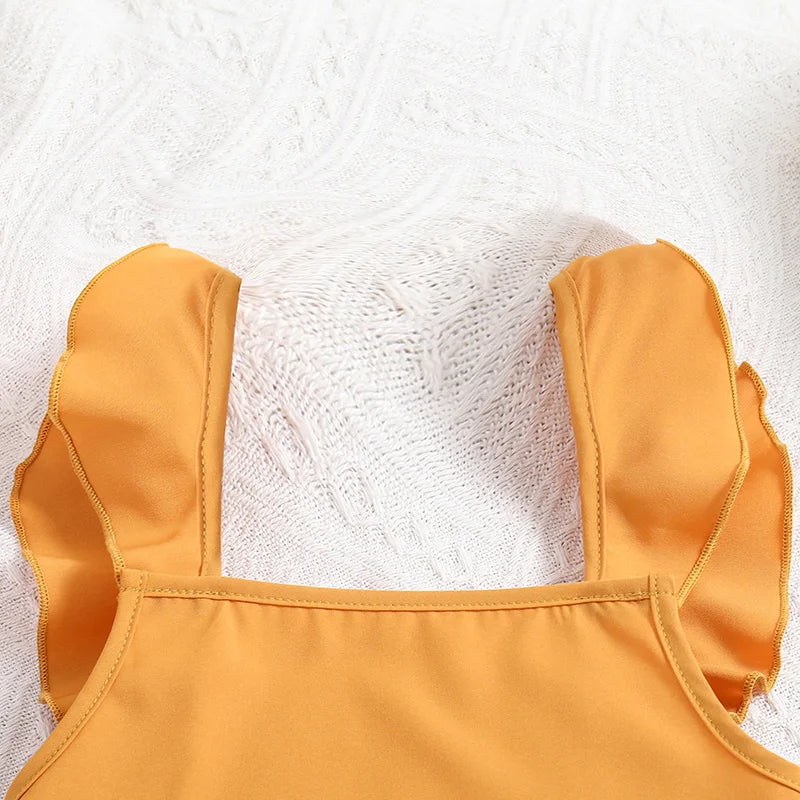 Ensemble de vêtements haut et bas pour enfants, haut à manches courtes + jupe épissure, jaune uni, conçu pour l'été, mode classique, fête décontractée