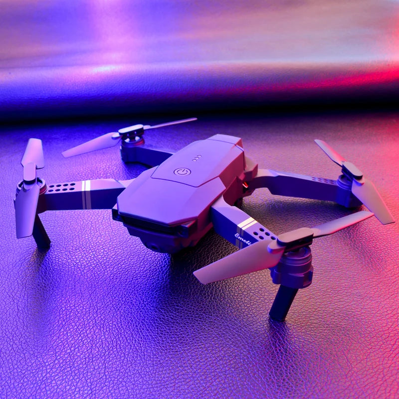 Drone haute définition E88/E58 4K, photographie aérienne, avion RC Intelligent à hauteur fixe, avion à quatre axes, jouets pour enfants garçons