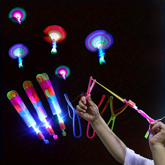 8pcs, Led Lighting Up Luminous Toy, Flying Slingshot, Flying Toys, Fast Catapult Luminous Toy, Glow In Dark Party Supplies, Party Favors, Holiday Gifts, Children Gifts, Outdoor Luminous Toys